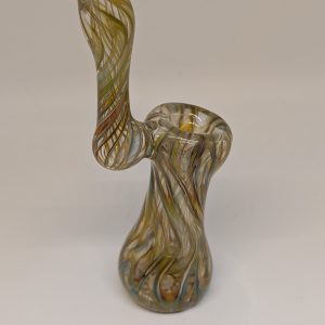 This hand-blown glass bubbler combines art and function for a smooth, filtered smoking experience. Each piece is uniquely crafted with vibrant colors and intricate details, making it as much a collector’s item as a practical accessory.