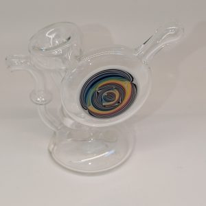 Experience smooth, clean hits with this hand-blown glass bubbler. Each piece is one-of-a-kind, featuring vibrant colors and a design that blends artistry with functionality.