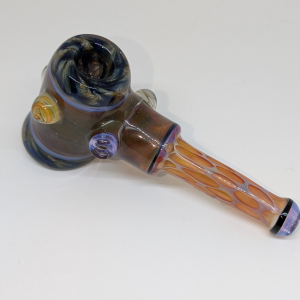 Experience the craftsmanship of a classic hand-blown glass pipe — durable, functional, and made with care. Each piece is uniquely shaped and colored, showcasing subtle variations that make every piece one-of-a-kind.
