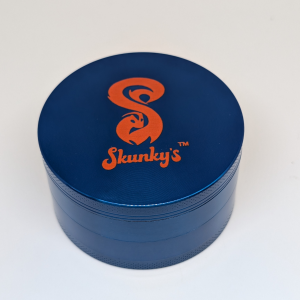 Metal grinder with sharp teeth, kief catcher, and magnetic lid — durable, efficient, and built for smooth grinding.
