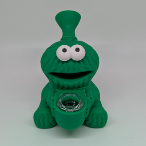 Add a playful twist to your collection with this green Elmo-inspired silicone hand pipe—a fun, unexpected spin on a classic character. Styled after Elmo but reimagined in a bold green colorway, this piece stands out with personality while still delivering solid performance.